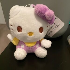 Purple hello kitty plush clip on